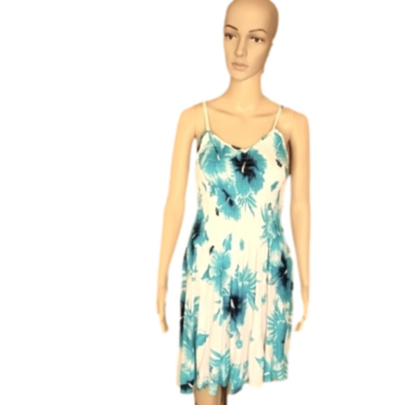 Zury summery teal and white dress with flowers on it. Ajustable straps. Size M/L - Picture 1 of 6
